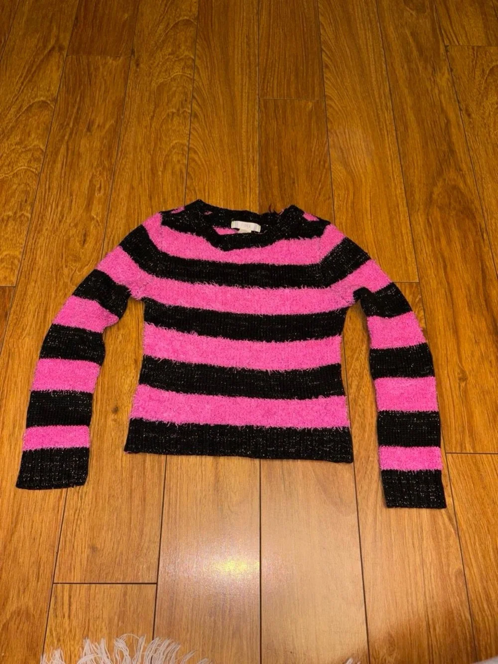 black and pink striped sweater